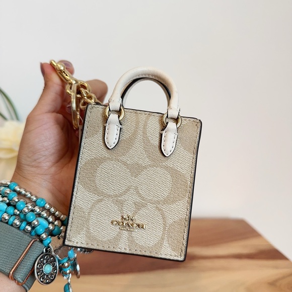 NWT Coach North/South Mini Tote Bag Charm In Signature‎ Canvas - Picture 5 of 6